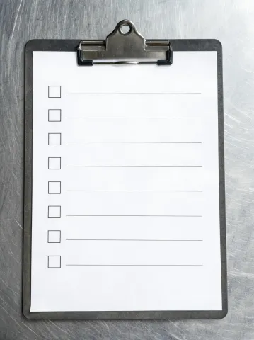 Printed RFQ checklist on a clipboard